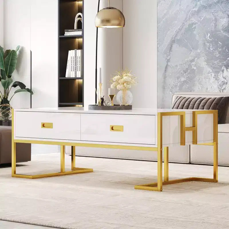Tavolino da salotto moderno rettangolare - con 4 cassetti e base in metallo dorato; un elegante centrotavola minimalista per il soggiorno